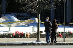Flowers and candles were laid in front of Brown University's Barus and Holley building, seen here on Monday, Dec. 15, 2025, after a shooting left two dead and nine injured on Saturday. Flowers and candles were laid in front of Brown University's Barus and Holley building, seen here on Monday, Dec. 15, 2025, after a shooting left two dead and nine injured on Saturday.