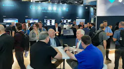 Attendees gather at the Milestone Systems booth during ISC West 2026, where the company highlighted advancements in video management software, AI-driven analytics and cloud-based security solutions.