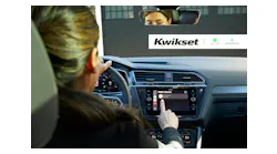 A driver uses a vehicle dashboard interface powered by CarPlay or Android Auto to lock or unlock a Kwikset smart lock before arriving home.