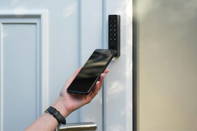 Nuki&rsquo;s Keypad 2 NFC enables secure tap-to-unlock access at the front door using smartphones, wearables, fingerprints, or access codes.
