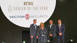 Vector Security accepted a dealer award at the DMP Owners Forum. Vector Security accepted a dealer award at the DMP Owners Forum.