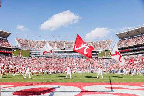 Saban Field at Bryant-Denny Stadium during a game day crowd as the University of Alabama implements new counter-drone technology to monitor and secure campus airspace.