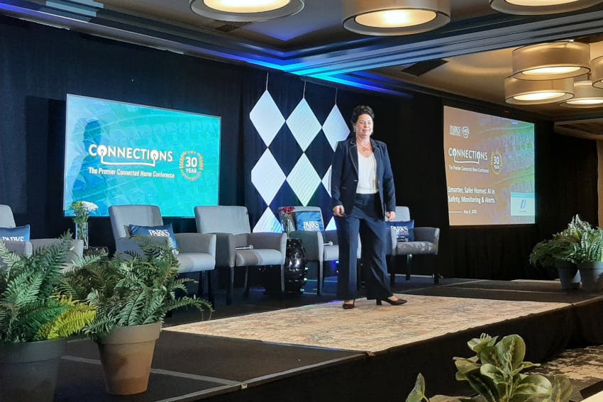 Elizabeth Parks addresses attendees during CONNECTIONS 2026, where Parks Associates marked 30 years of tracking the evolution of the connected home market.