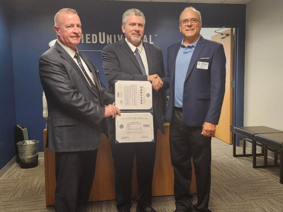 Allied Universal Long Island branch manager Michael Matz receives the Patriot Award for supporting employees serving in the National Guard and Reserve and their families.