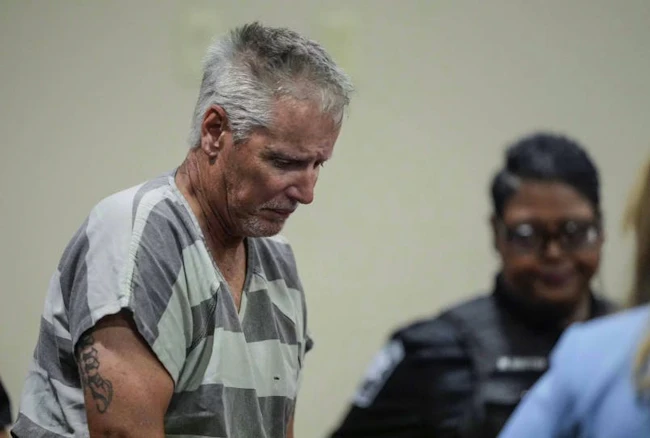 Colin Gray, father of convicted Apalachee High School shooter Colt Gray, enters the Barrow County courthouse for his first court appearance on Sept. 6, 2024, in Winder, Ga. Gray was sentenced to 15 years in prison on July 30, 2026, in connection with the shooting after prosecutors argued he failed to prevent his son from accessing the firearm used in the attack.