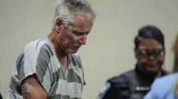 Colin Gray, father of convicted Apalachee High School shooter Colt Gray, enters the Barrow County courthouse for his first court appearance on Sept. 6, 2024, in Winder, Ga. Gray was sentenced to 15 years in prison on July 30, 2026, in connection with the shooting after prosecutors argued he failed to prevent his son from accessing the firearm used in the attack.