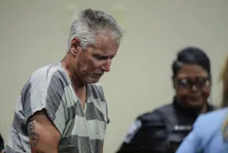 Colin Gray, father of convicted Apalachee High School shooter Colt Gray, enters the Barrow County courthouse for his first court appearance on Sept. 6, 2024, in Winder, Ga. Gray was sentenced to 15 years in prison on July 30, 2026, in connection with the shooting after prosecutors argued he failed to prevent his son from accessing the firearm used in the attack.