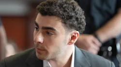 Luigi Mangione talks to one of his lawyers in Manhattan Supreme Court on Tuesday, Aug. 11, 2026, in Manhattan, New York. (Barry Williams/New York Daily News/Pool/TNS)