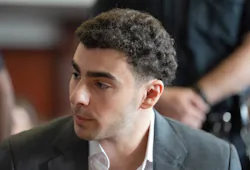 Luigi Mangione talks to one of his lawyers in Manhattan Supreme Court on Tuesday, Aug. 11, 2026, in Manhattan, New York. (Barry Williams/New York Daily News/Pool/TNS)